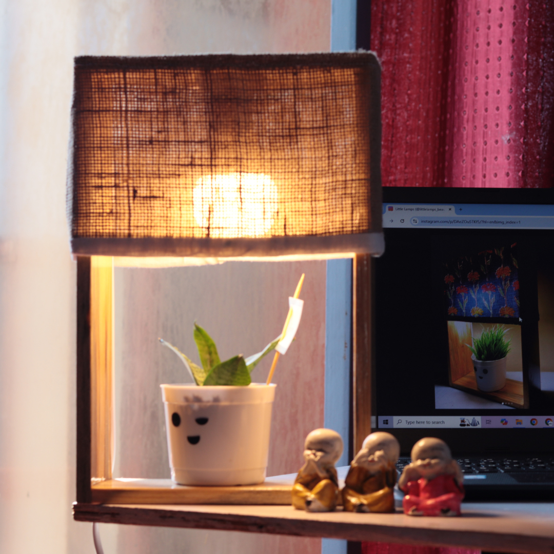 Pine Glow Earthy Essential Table Lamp with real snake Plant