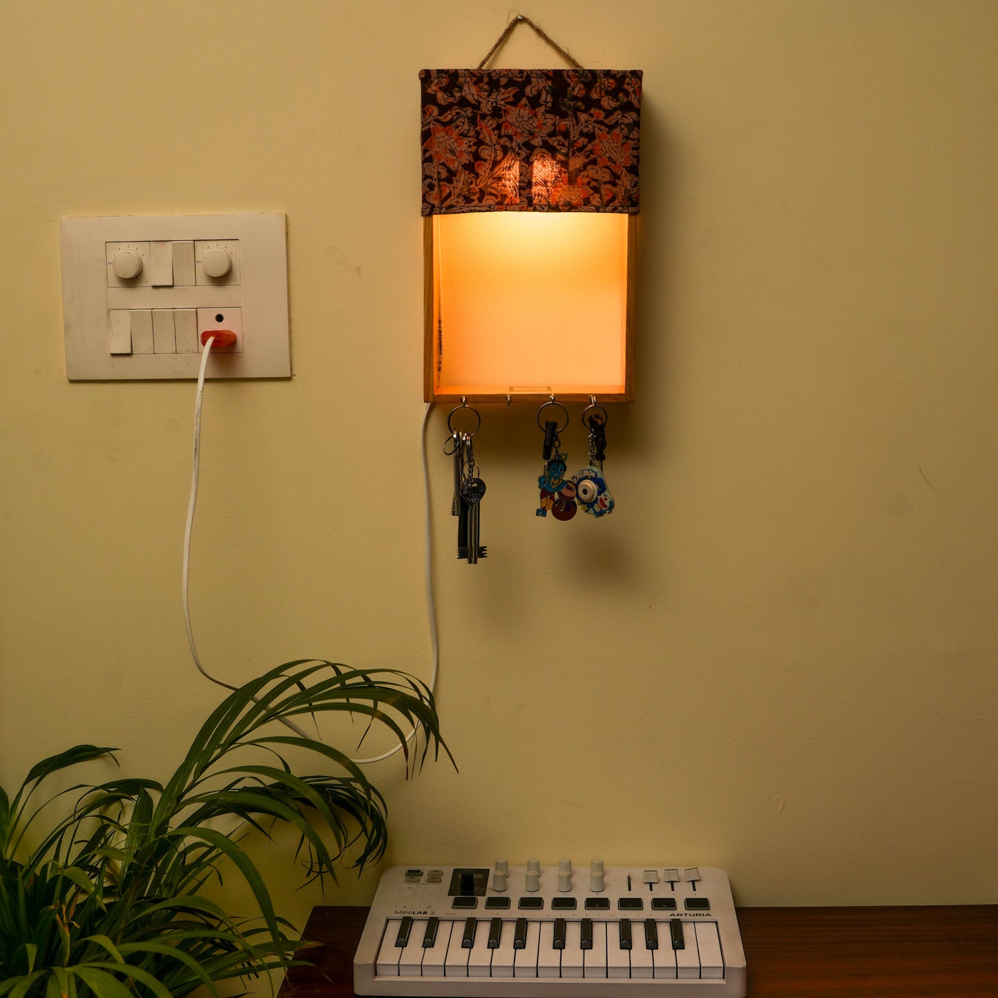 Pine Glow Key Holder wall mounted Lamp- ( in Kalamkari cloth)
