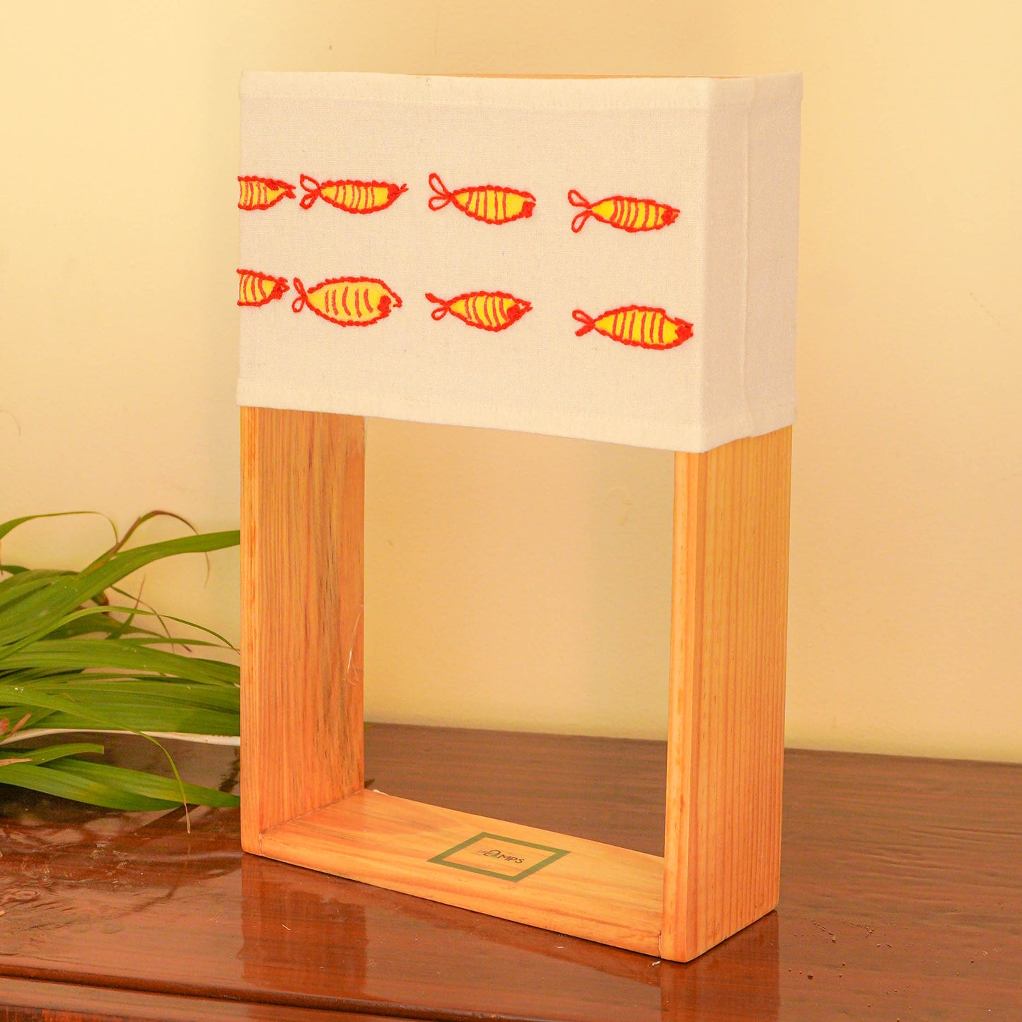 Pine Glow Madhubani Charm Lamp – Hand-Painted and hand embroidered Wooden Table Lamp with Fish Motif