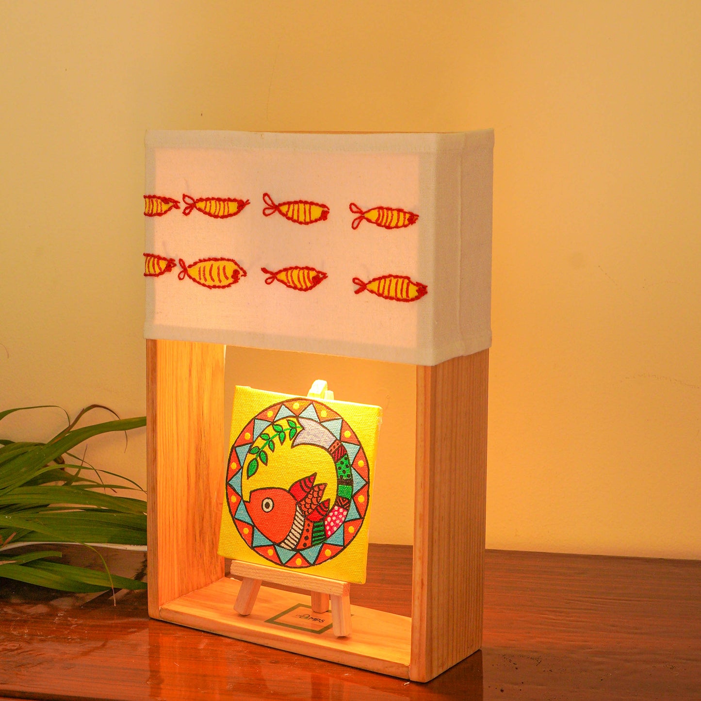 Pine Glow Madhubani Charm Lamp – Hand-Painted and hand embroidered Wooden Table Lamp with Fish Motif
