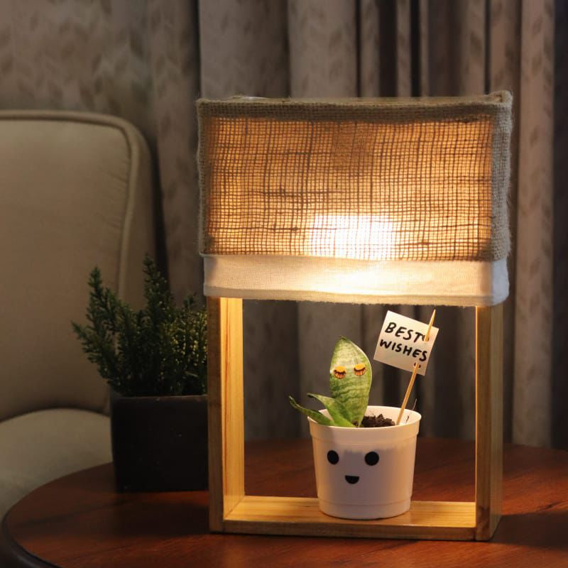 Pine Glow Earthy Essential Table Lamp with real snake Plant